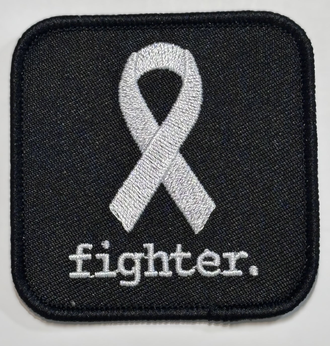 Square Patch — White Ribbon — fighter. — Black Background