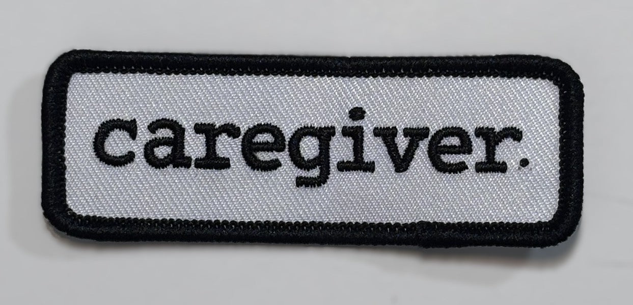 Panel Patch — caregiver. — Light (white/black)