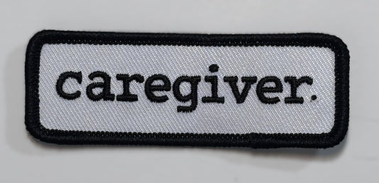 Panel Patch — caregiver. — Light (white/black)